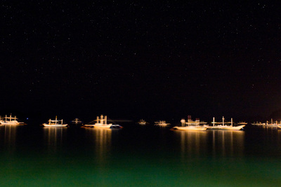 Лодки в гавани Эль Нидо.